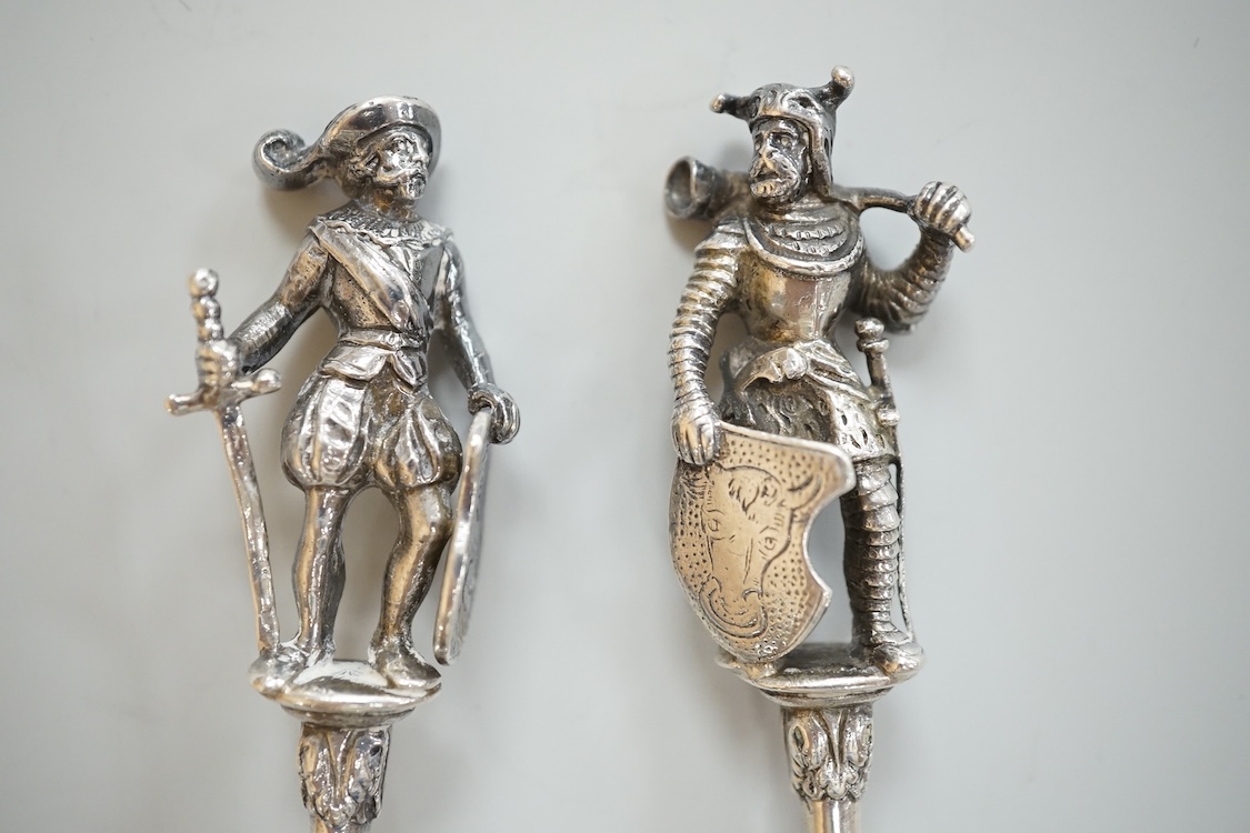 A pair of late 19th century Hanau silver spoons, with warrior finials, import marks for John George Smith, London, 1898, 18.6cm, 5oz.